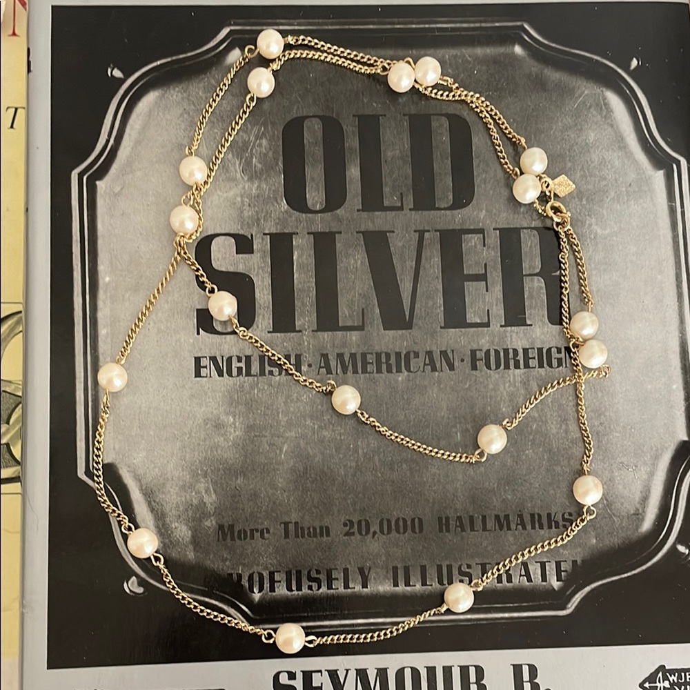 Sarah Coventry Faux Pearl station necklace.